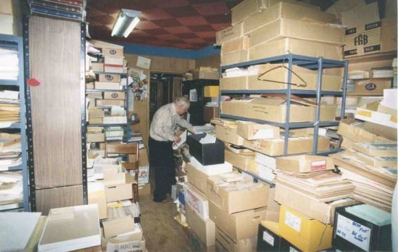 Kasimir Bileski Searching in his Extensive Stamp Stock